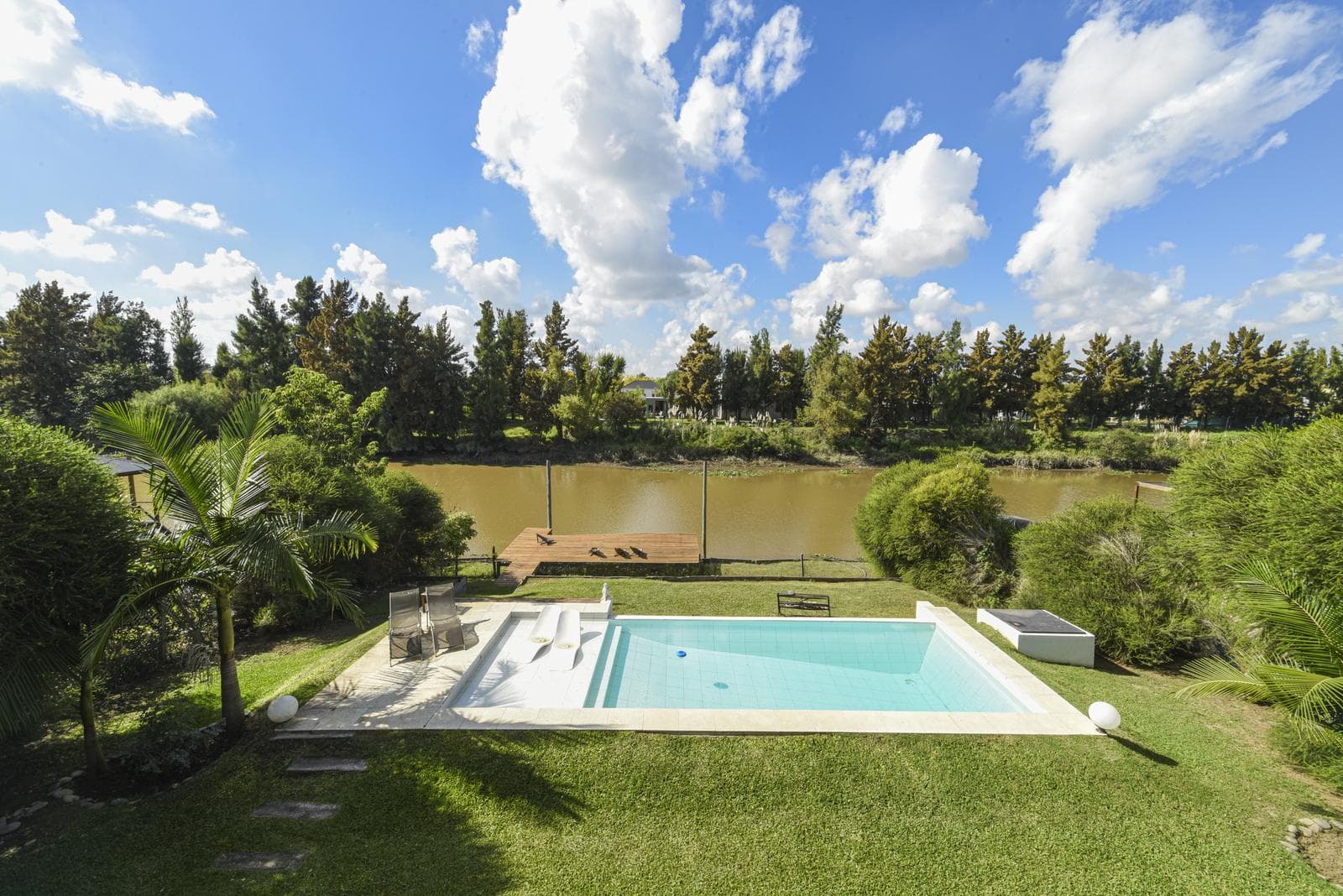 House by the River with a Pool in the San Benito Nautical Neighborhood