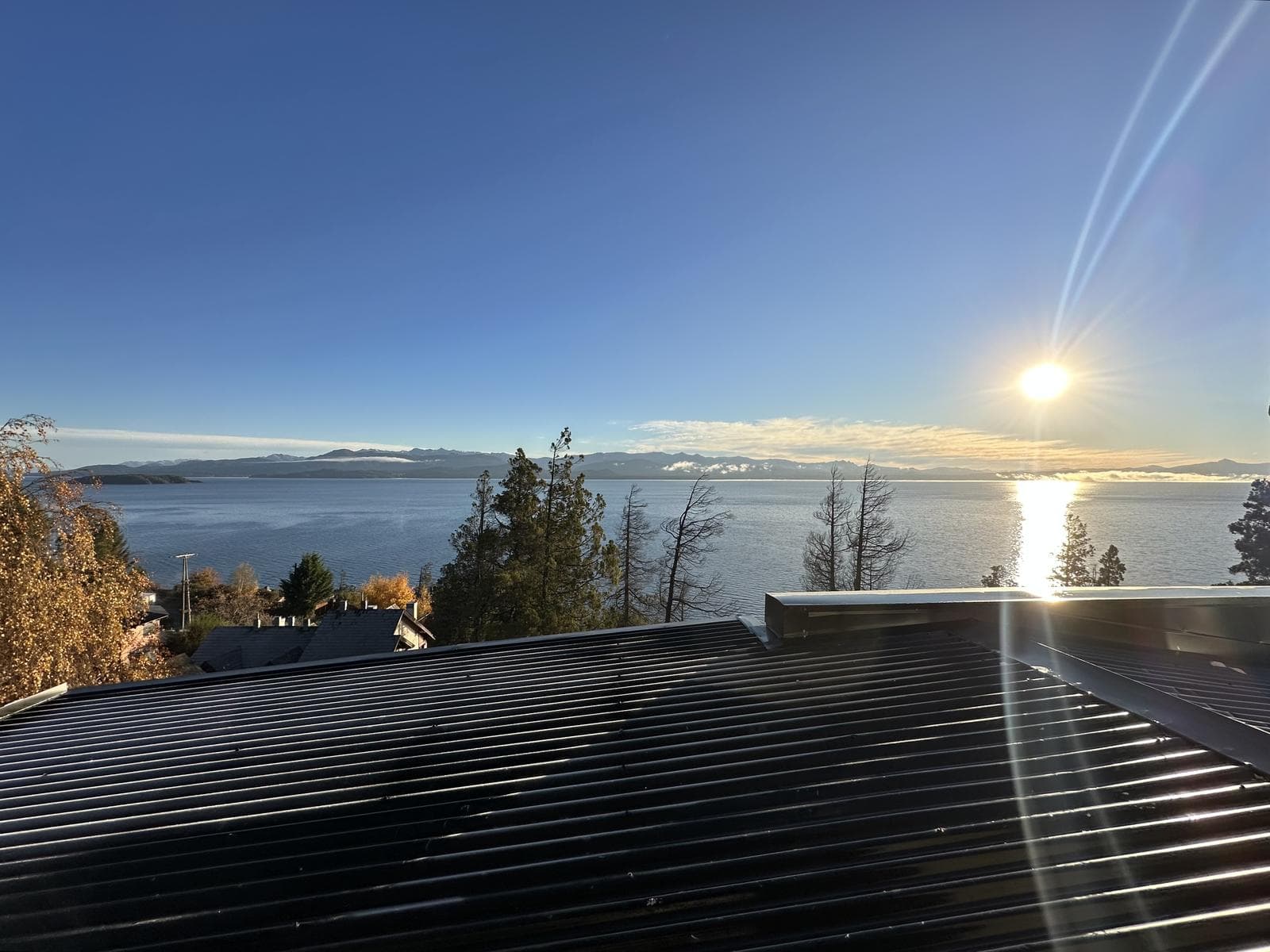 3-bedroom lakefront apartment with a balcony, terrace, and grill