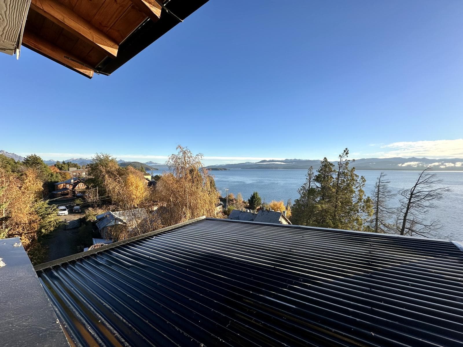 3-bedroom lakefront apartment with a balcony, terrace, and grill