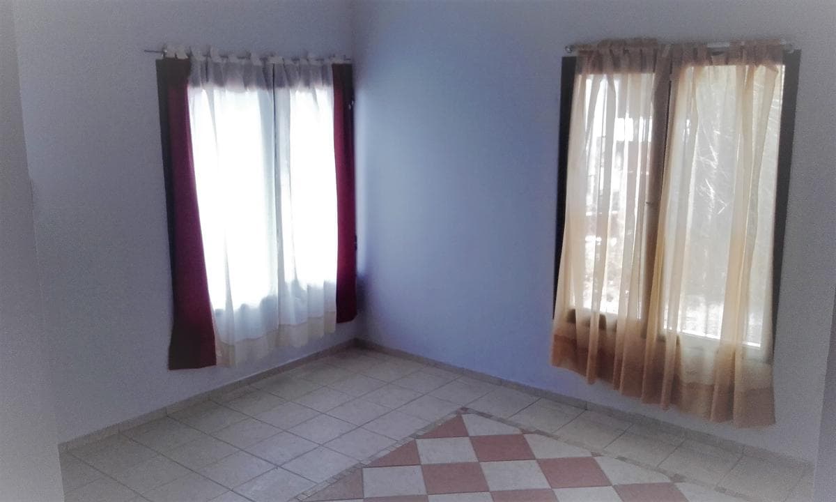 2-bedroom duplex for sale with a beautiful view, located on a paved street 5 blocks from downtown, west-facing, with natural gas available on the street, in a residential neighborhood