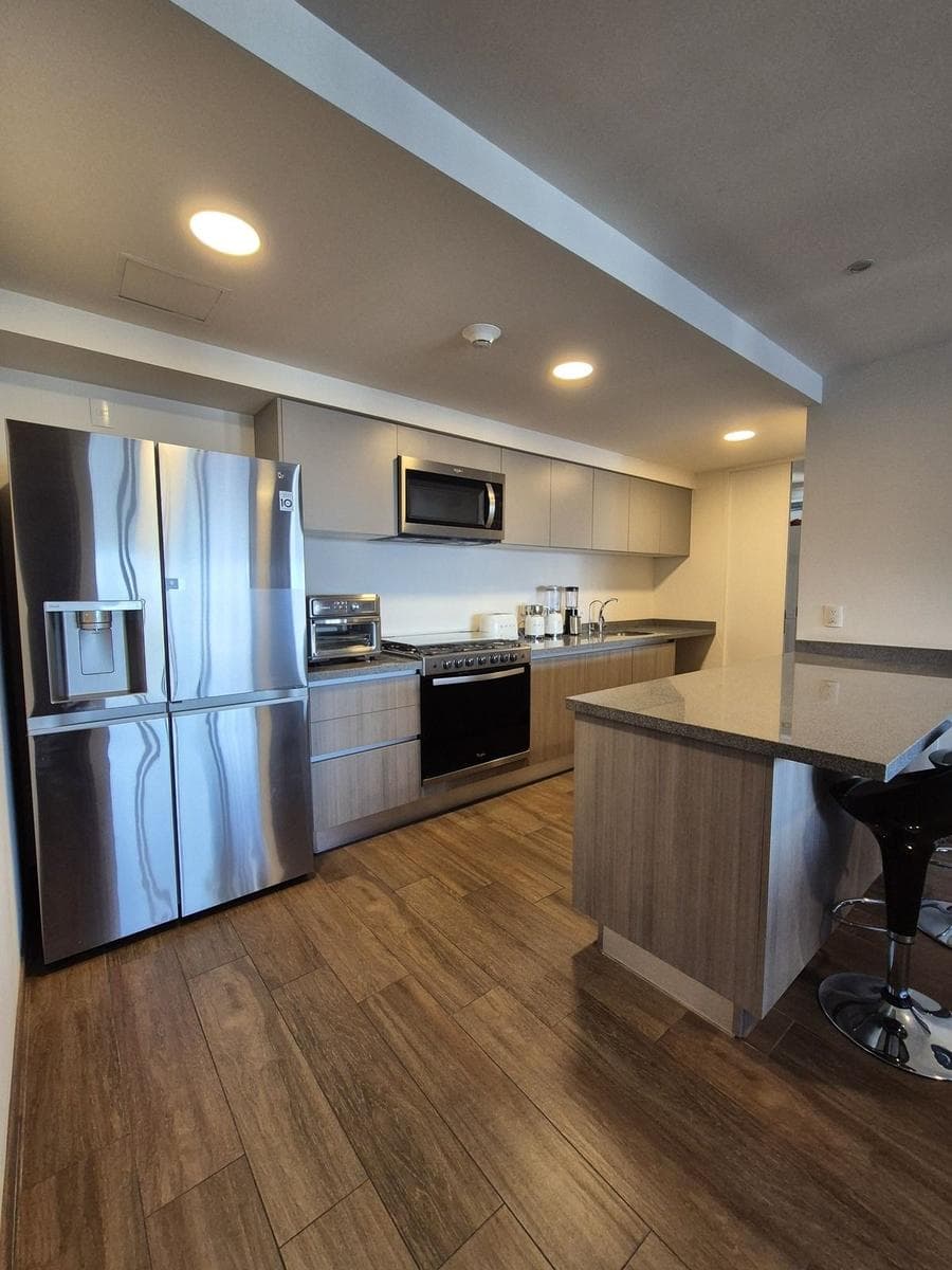 Apartment for Sale in We Santa Fe with a Balcony, Panoramic View, and Luxury Amenities