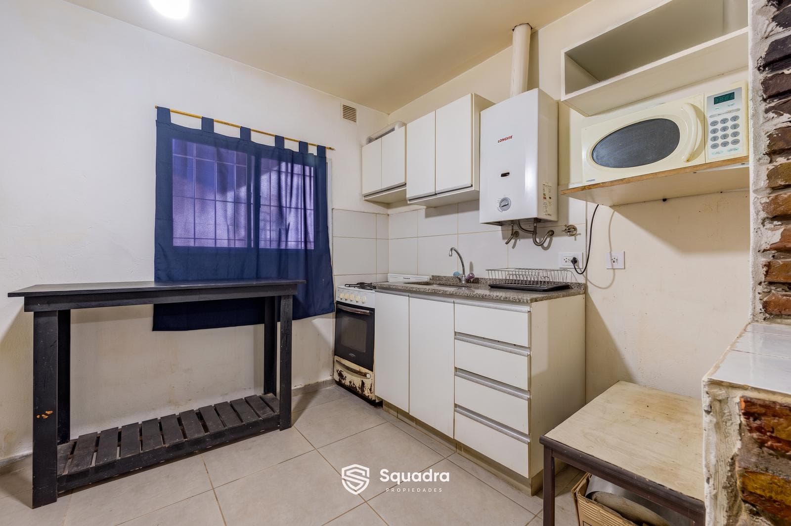 FOR SALE - House with a hallway in a renovated apartment building, 2 bedrooms, patio - Belgrano Neighborhood, Rosario.