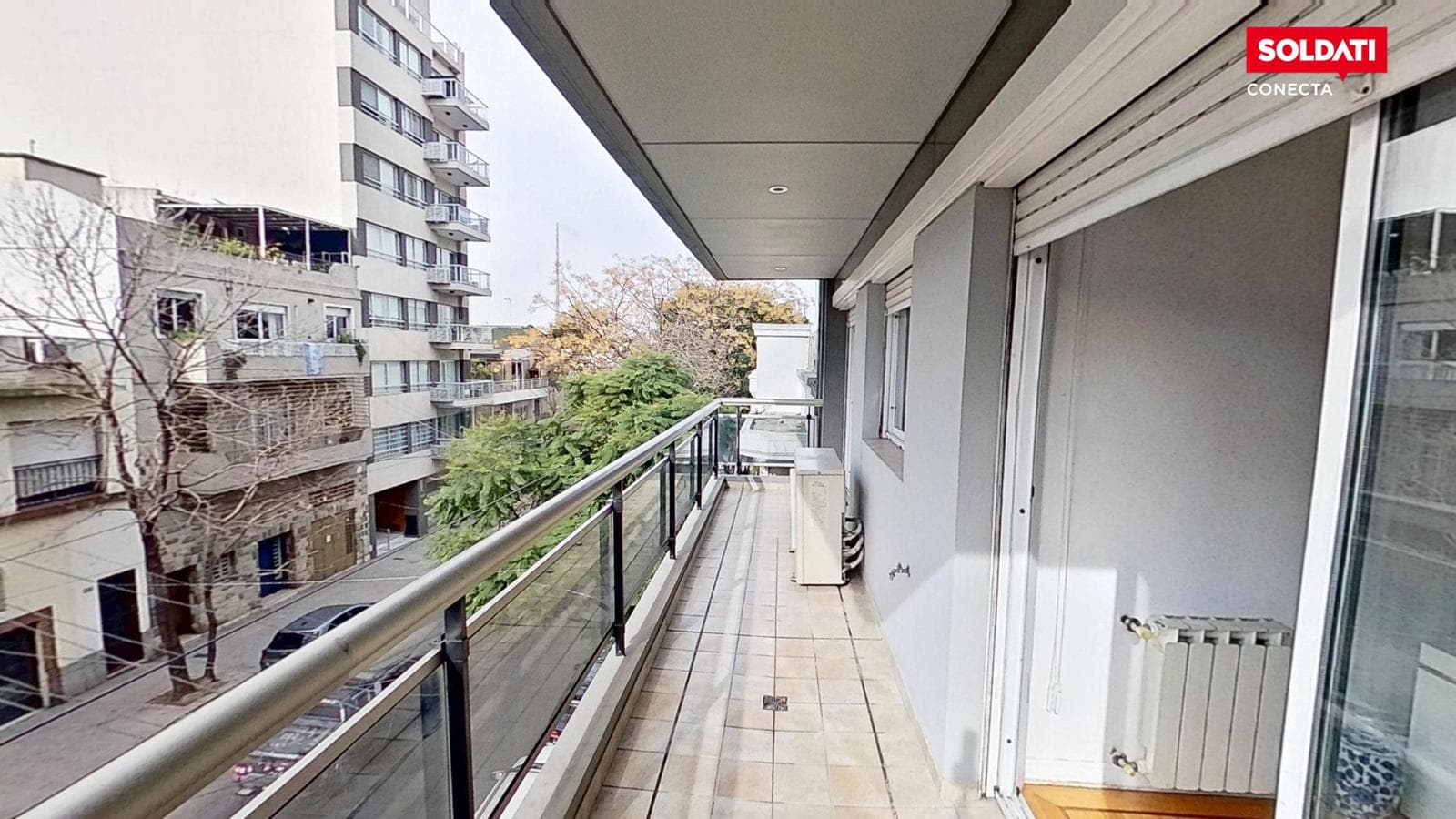 4-room apartment for sale with a front balcony and an open parking space.