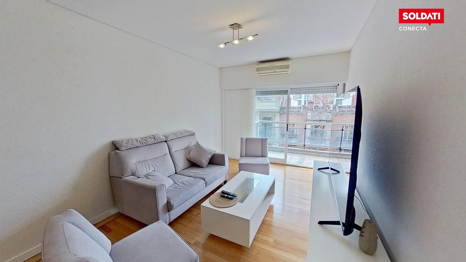 4-room apartment for sale with a front balcony and an open parking space.