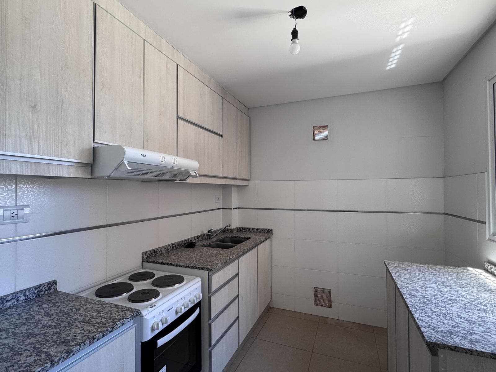 Apartment for Sale - 2 bedrooms with a patio and a garage