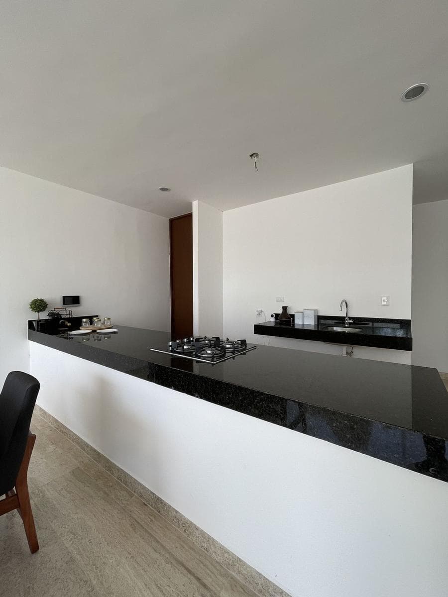 Two-bedroom townhouse with a covered garage in Cholul, Mérida
