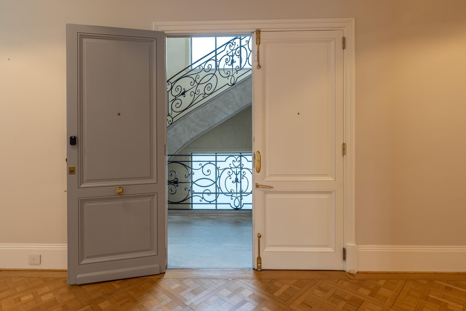 Stunning, fully renovated apartment with 2 parking spaces in a French-style building