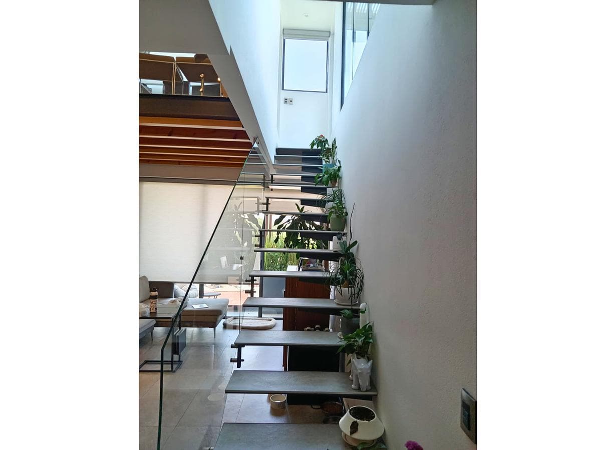 Penthouse for Sale in Acacias with a Private Roof Garden and Double-Height Ceilings