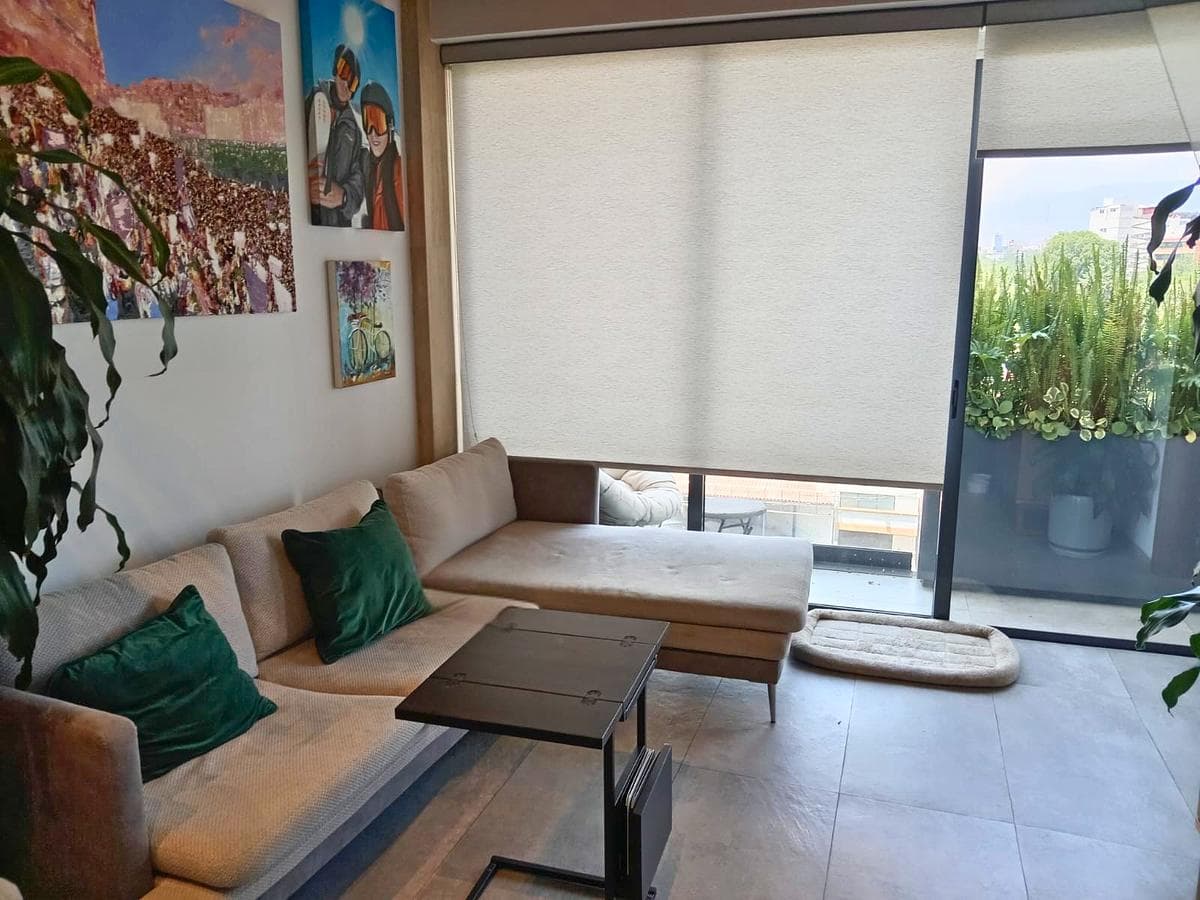 Penthouse for Sale in Acacias with a Private Roof Garden and Double-Height Ceilings