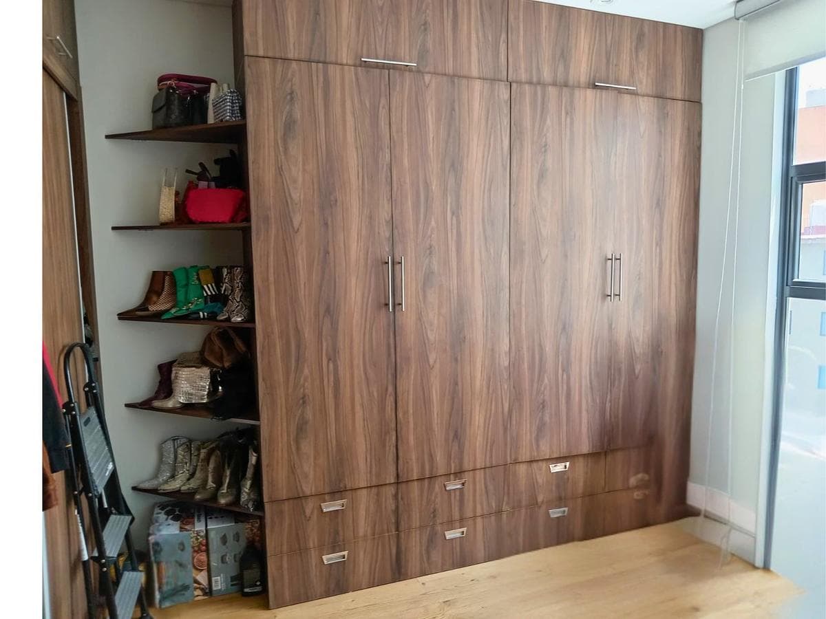 Penthouse for Sale in Acacias with a Private Roof Garden and Double-Height Ceilings
