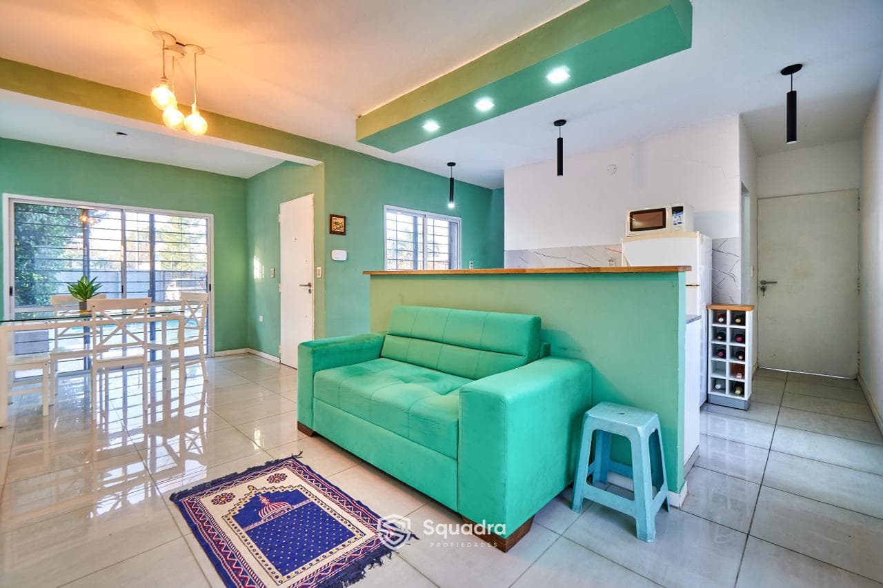 FOR SALE | TRADE - 2-bedroom house with a covered patio featuring a barbecue area and a pool - Don Quijote, Roldán.