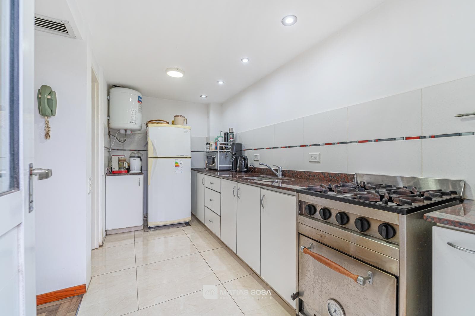 For Sale: 4-room house—plus apartment—garage—patio and barbecue area in San Carlos