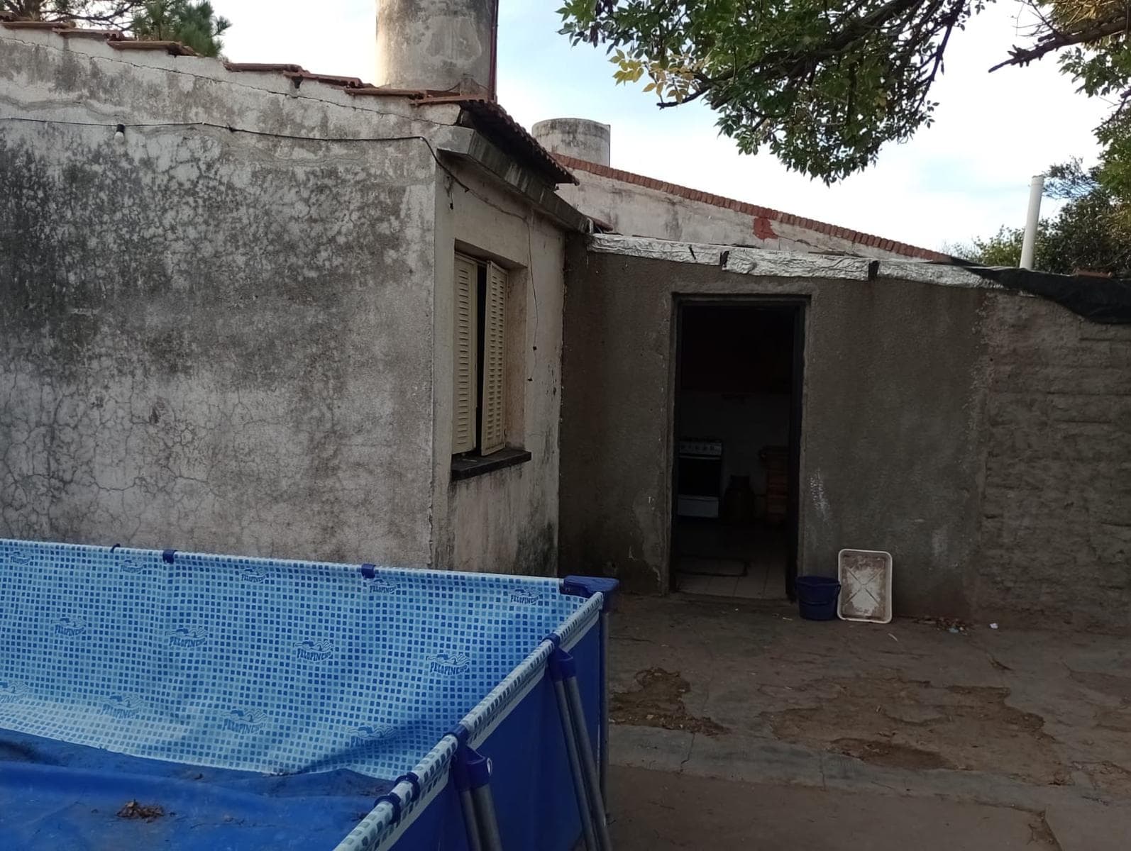 House with 3 bedrooms, a semi-covered garage, and a patio.