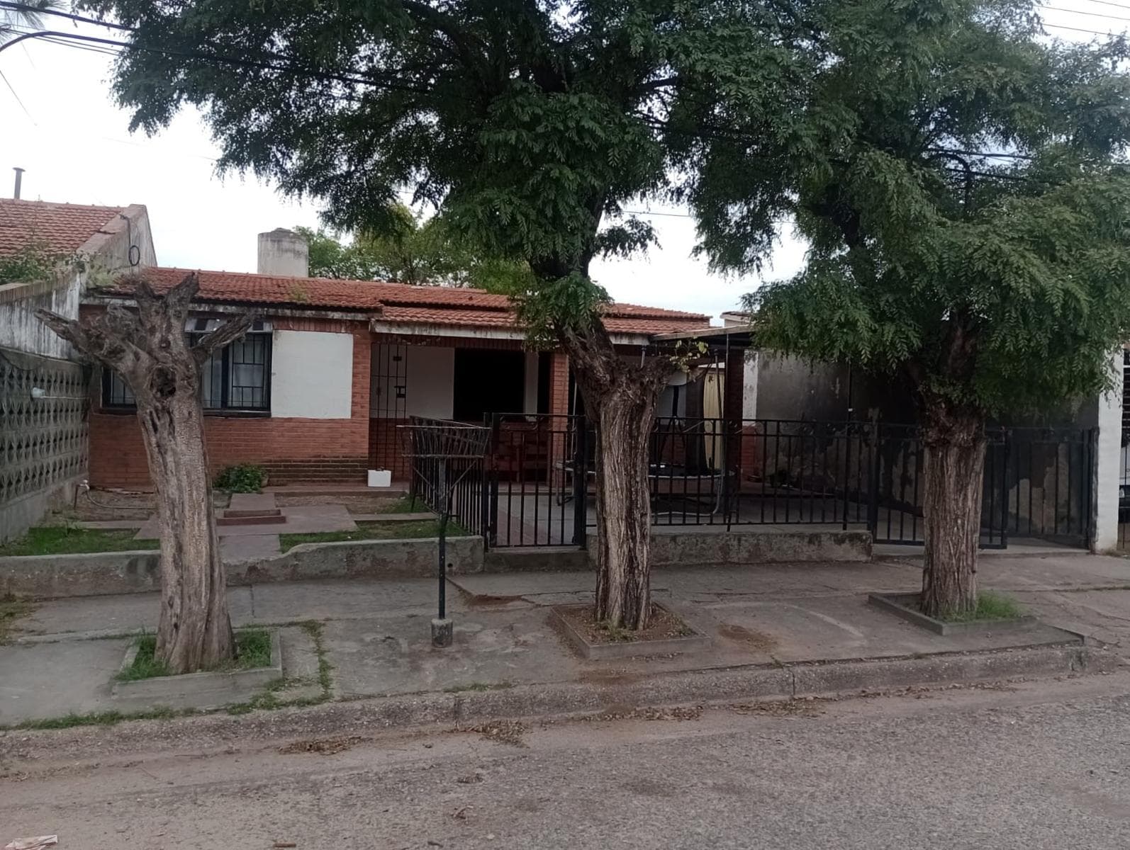 House with 3 bedrooms, a semi-covered garage, and a patio.