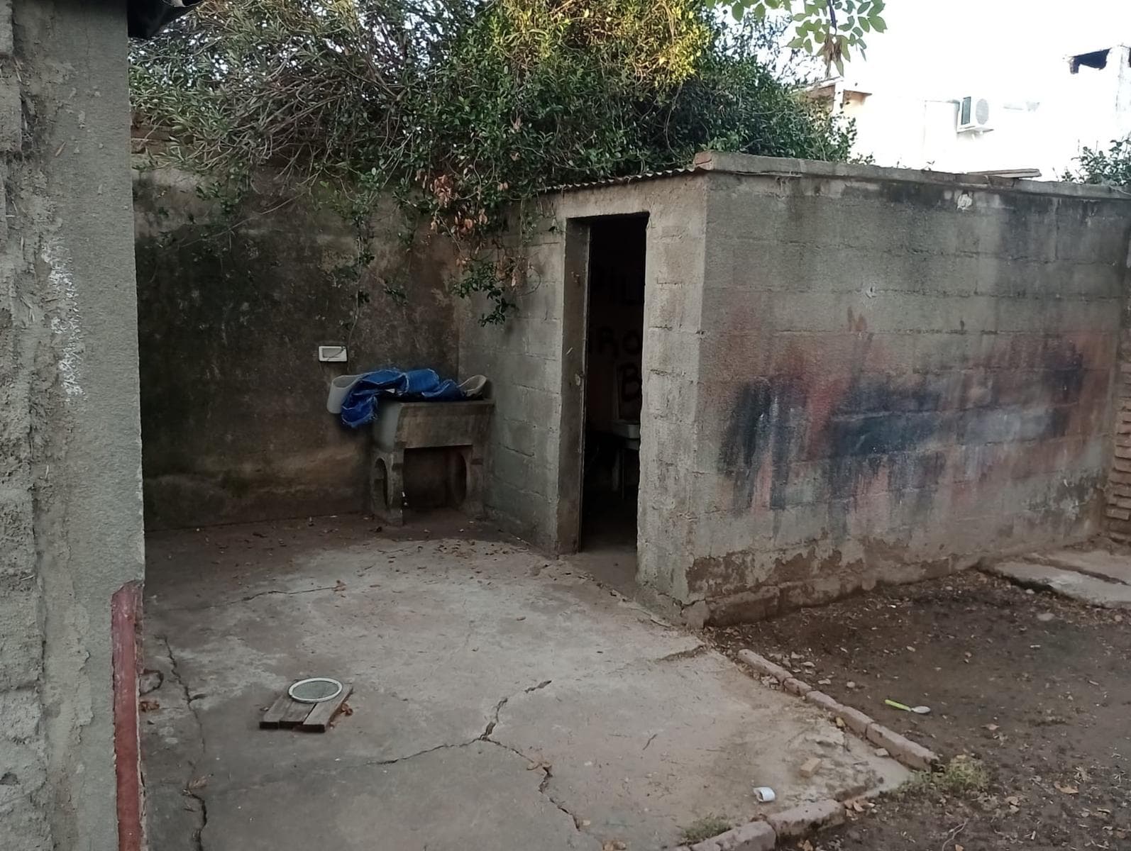 House with 3 bedrooms, a semi-covered garage, and a patio.