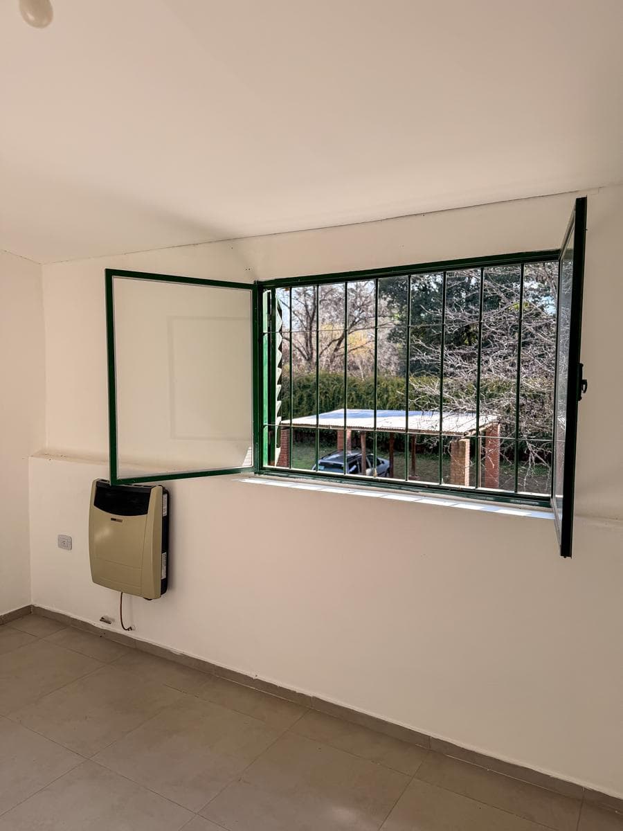 Apartment with a patio just a few meters from Route 5 and the Anisacate River