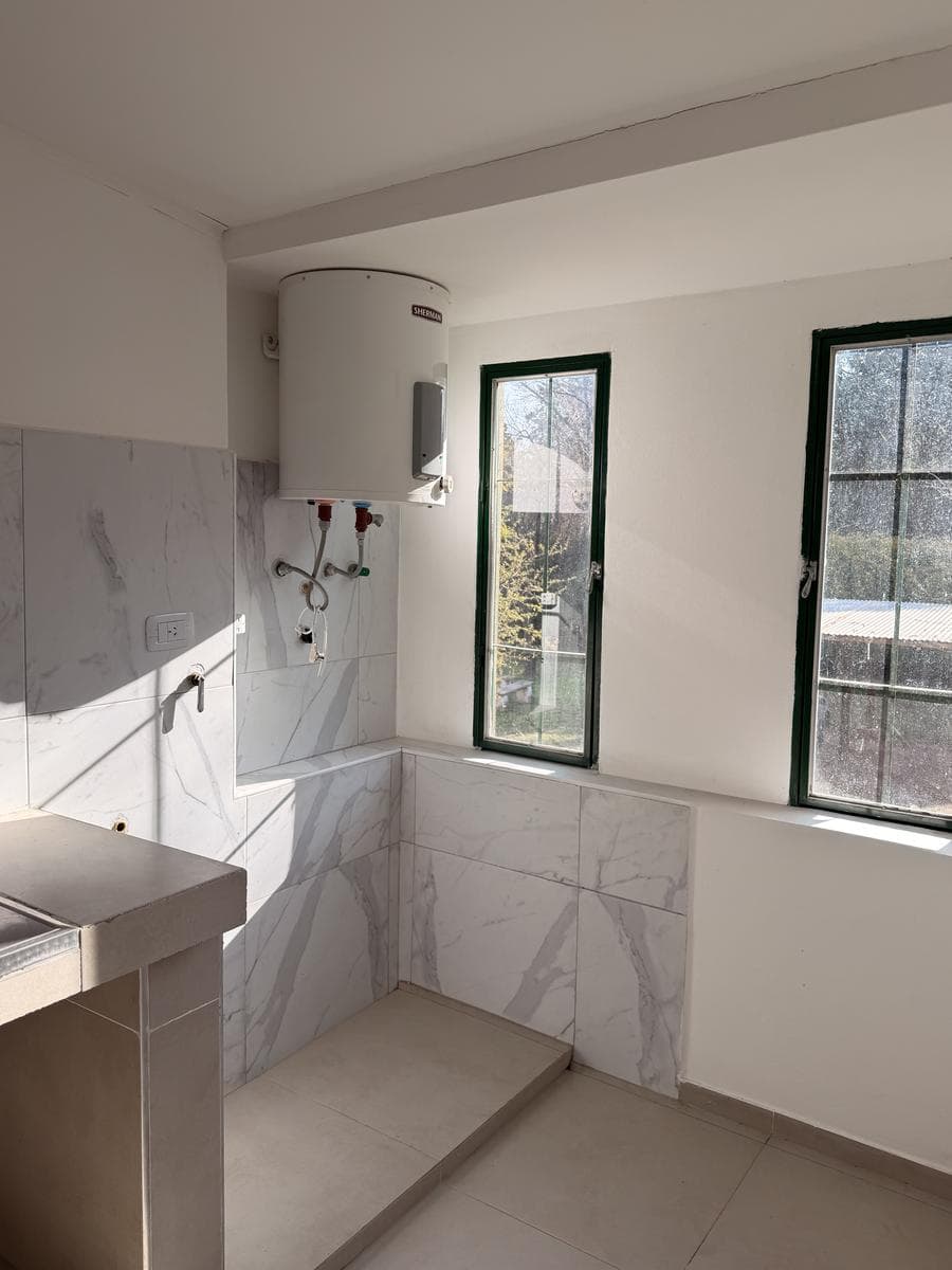 Apartment with a patio just a few meters from Route 5 and the Anisacate River