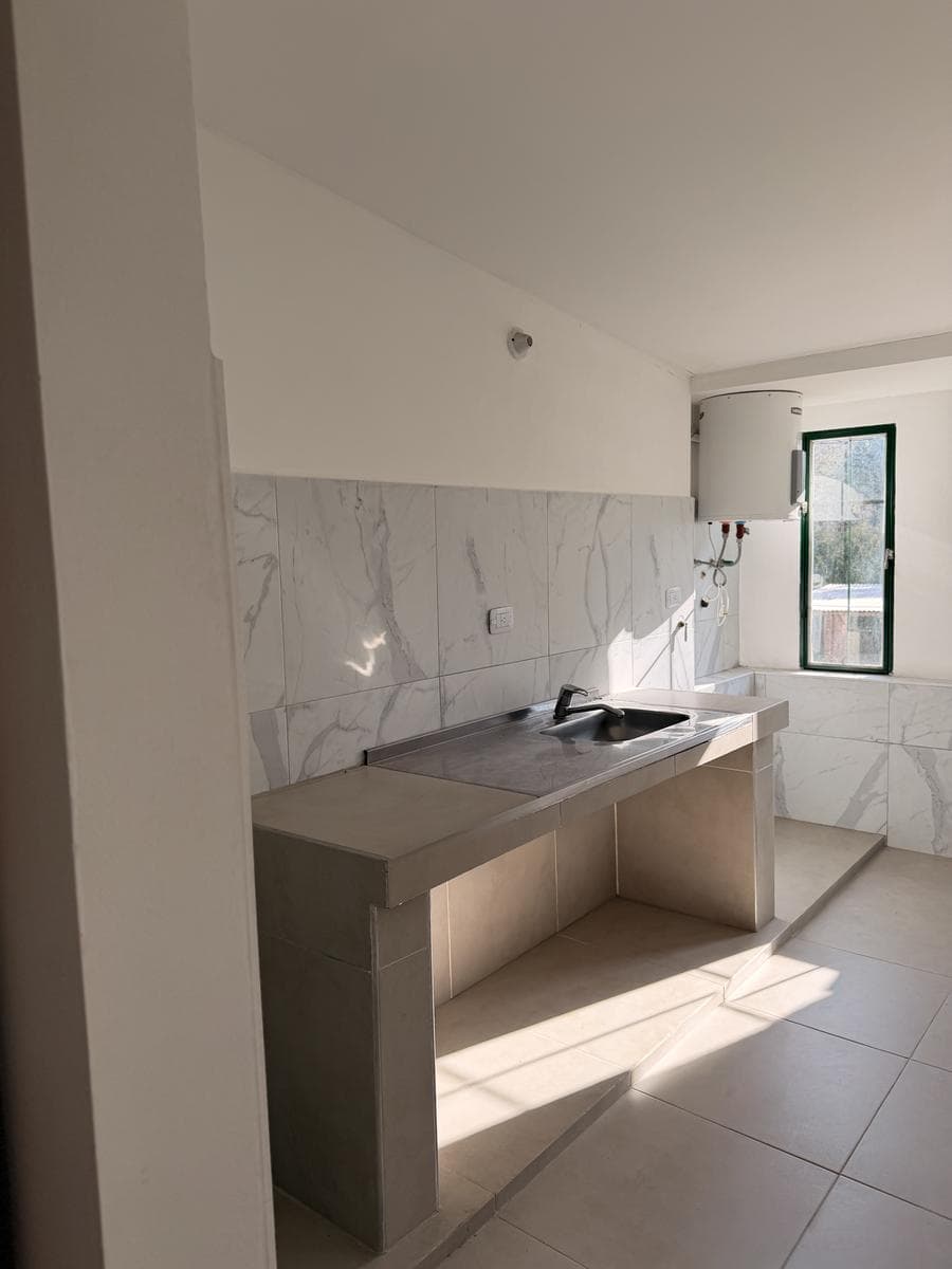 Apartment with a patio just a few meters from Route 5 and the Anisacate River