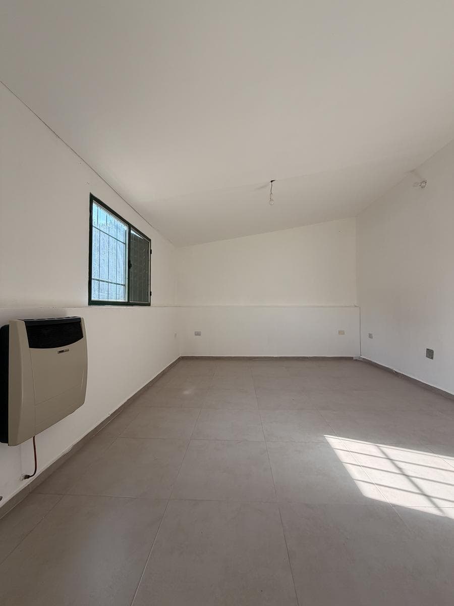 Apartment with a patio just a few meters from Route 5 and the Anisacate River