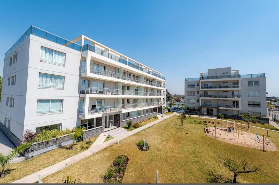 APARTMENT FOR SALE: TWO BEDROOMS, TWO BALCONIES, AND A GARAGE