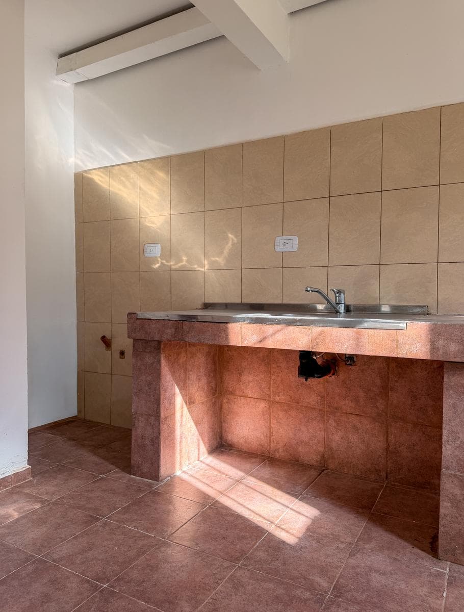 Apartment with a large patio just a few meters from Route 5 and the Anisacate River