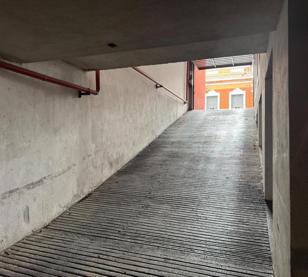 Garage with ramp access and automatic gate