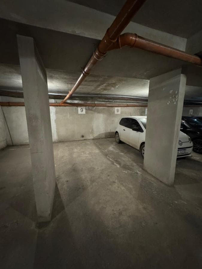 Garage with ramp access and automatic gate