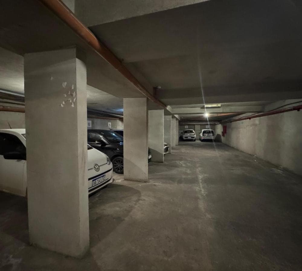 Garage with ramp access and automatic gate