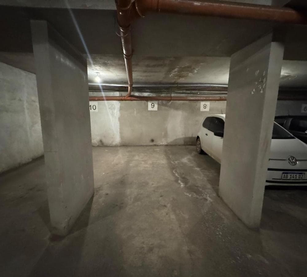 Garage with ramp access and automatic gate