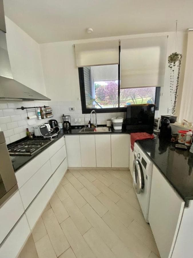 House on a spacious lot with a pool and potential for expansion