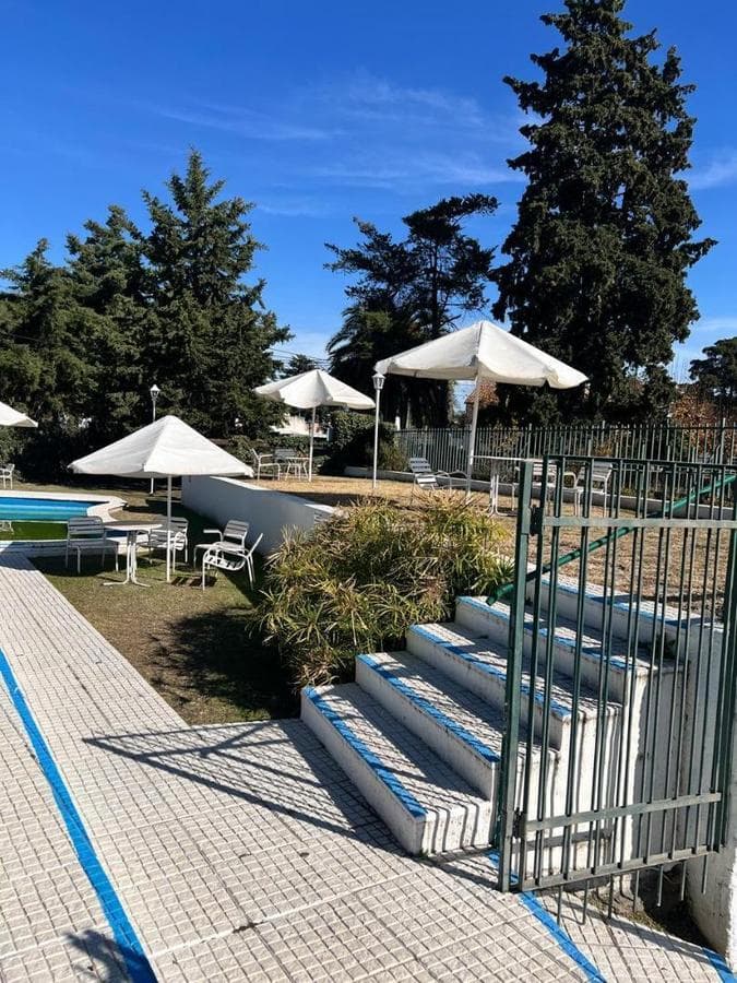 THREE-BEDROOM APARTMENT WITH GARAGE IN VILLA CARLOS PAZ