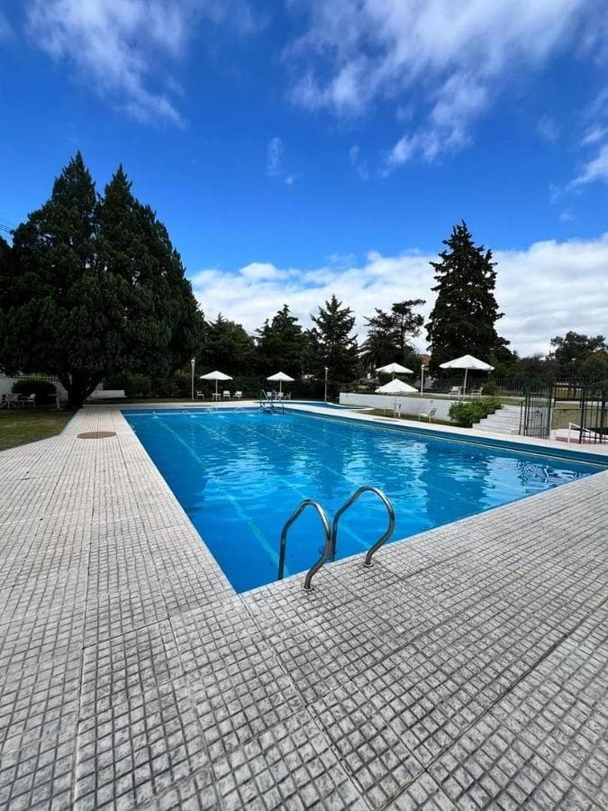 THREE-BEDROOM APARTMENT WITH GARAGE IN VILLA CARLOS PAZ