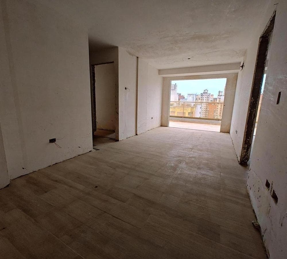 FOR SALE: 1-BEDROOM APARTMENT WITH SPACIOUS TERRACE IN A HIGH-END BUILDING
