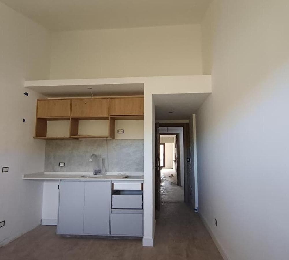 Studio apartment with a patio | Back-facing