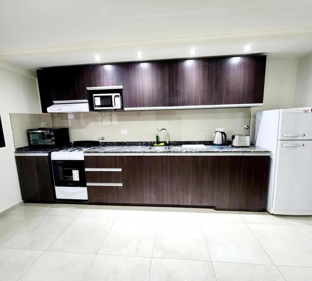 CARLOS PAZ APARTMENT - 1 bedroom with a patio