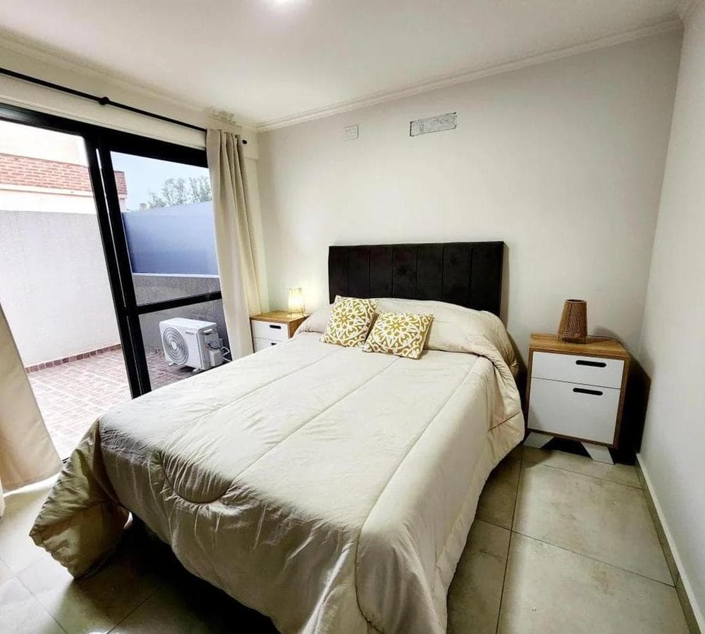 CARLOS PAZ APARTMENT - 1 bedroom with a patio