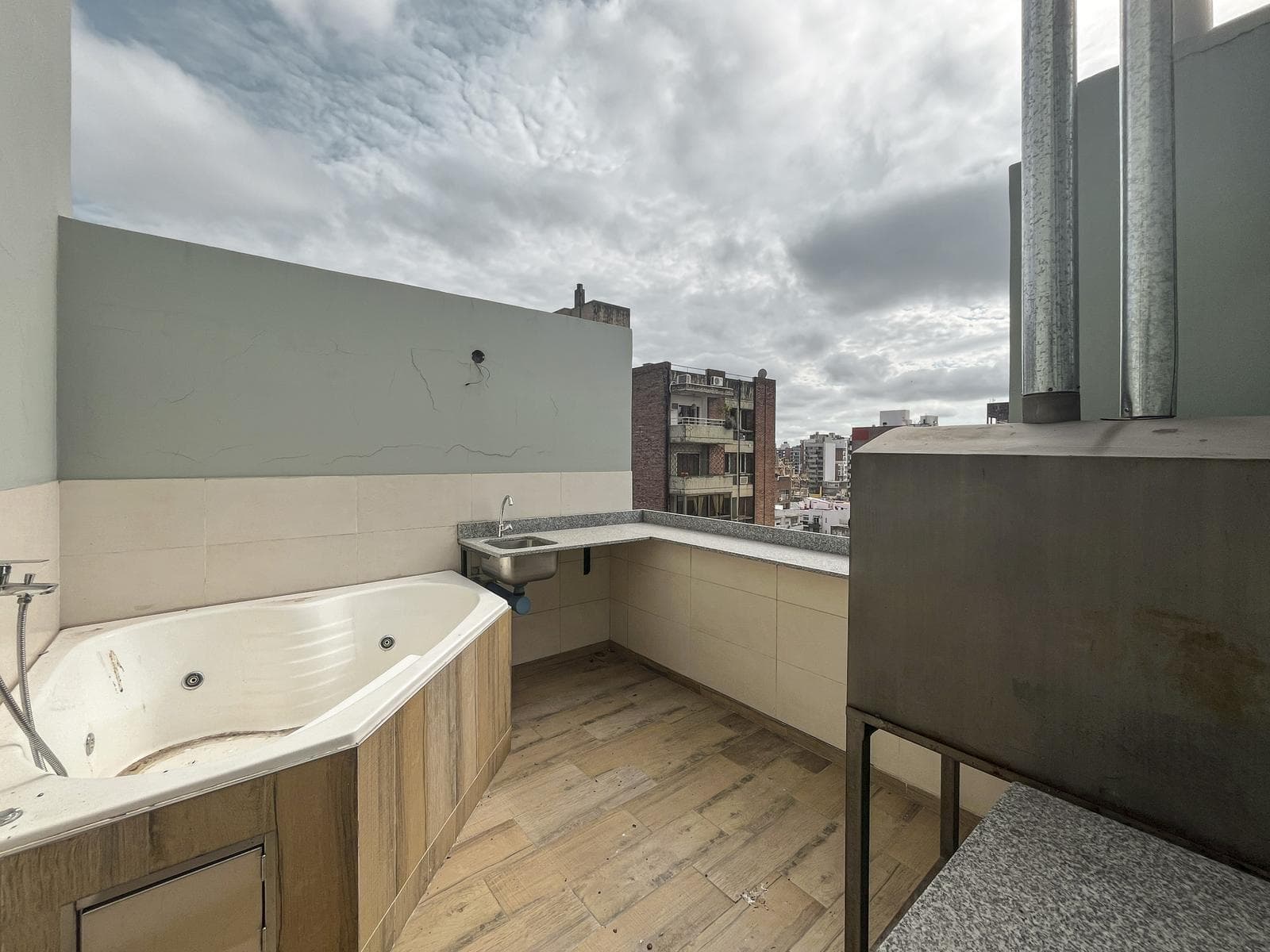 2-bedroom duplex apartment with a garage and a private terrace