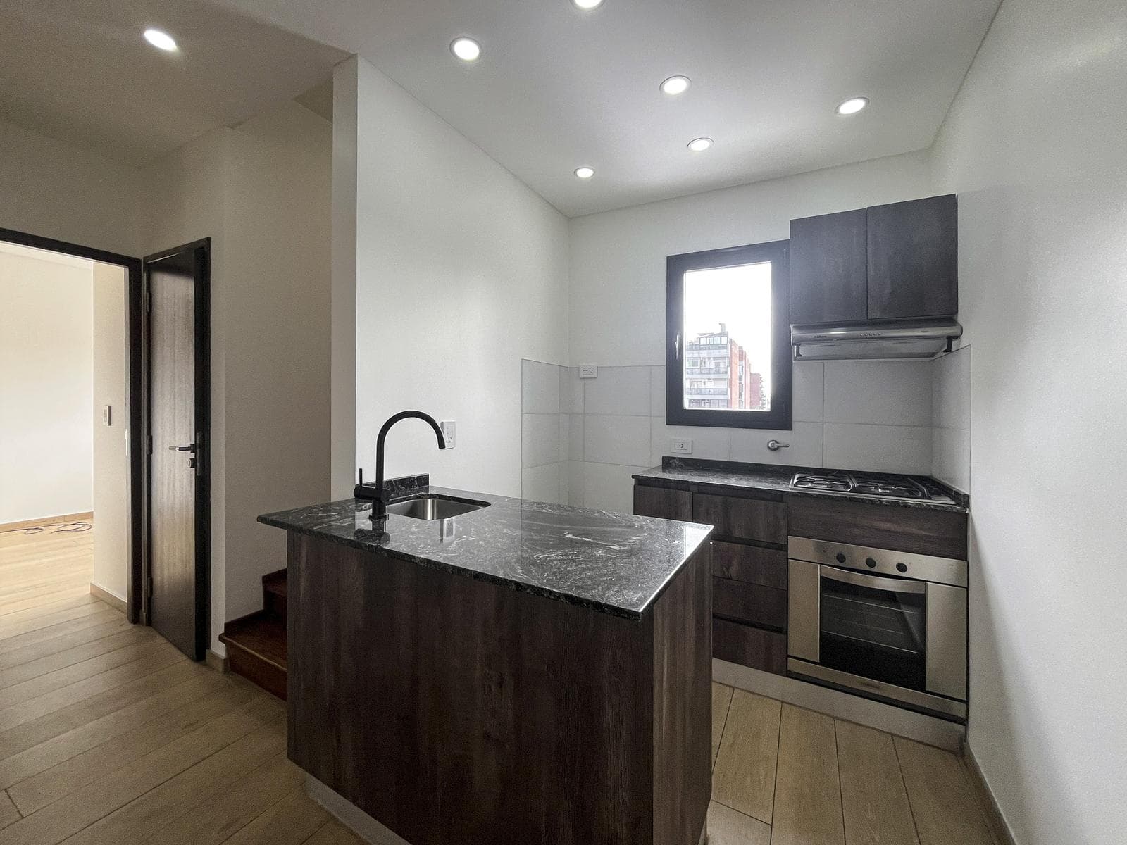 2-bedroom duplex apartment with a garage and a private terrace