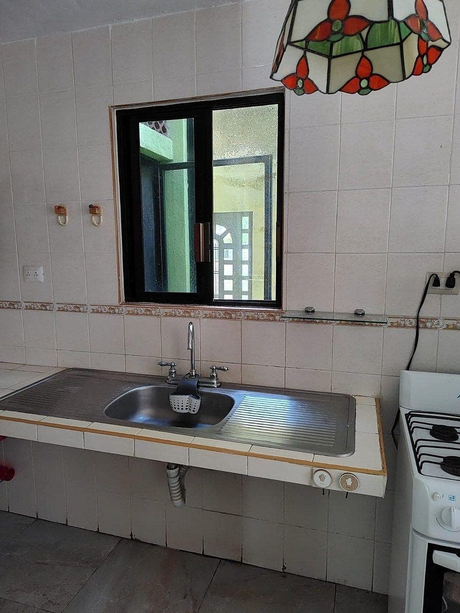 Corner house for sale, with separate commercial space.