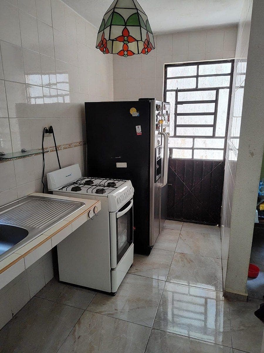 Corner house for sale, with separate commercial space.