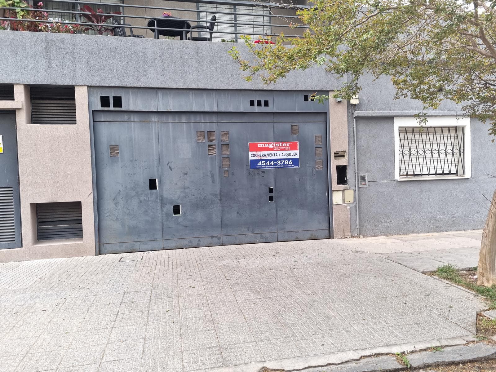 Covered, attached garage. Villa Urquiza