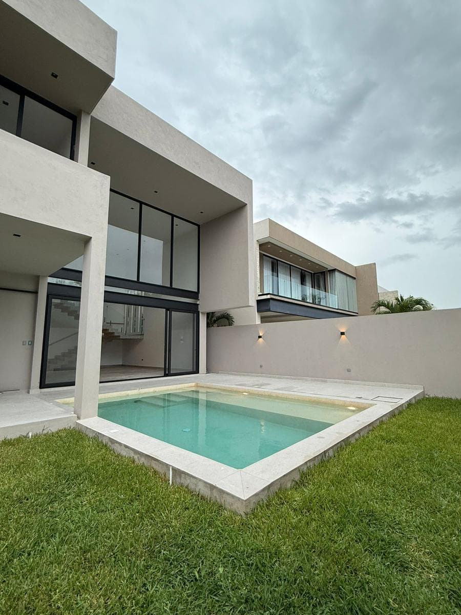 Luxury Home for Sale in a Gated Community with Amenities and a Pool
