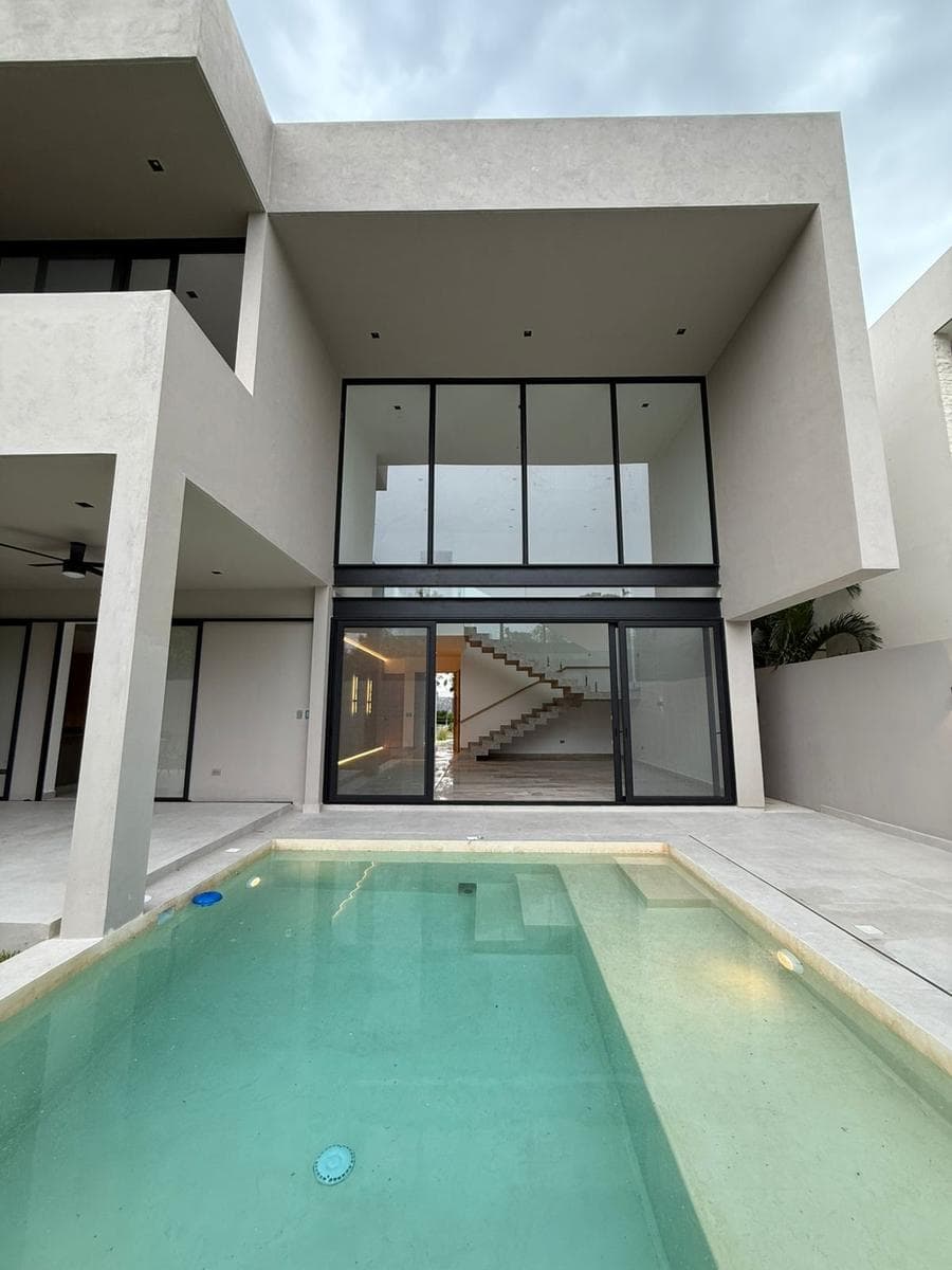 Luxury Home for Sale in a Gated Community with Amenities and a Pool