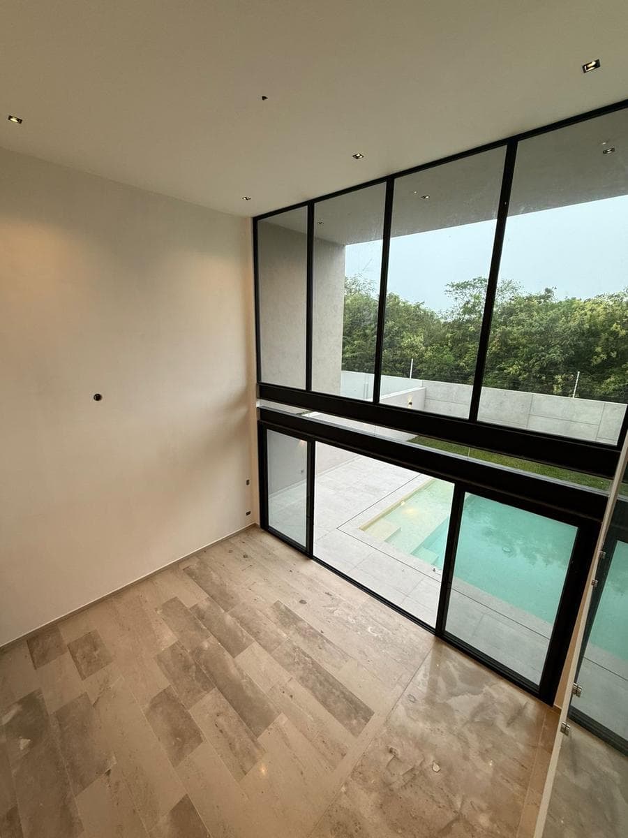 Luxury Home for Sale in a Gated Community with Amenities and a Pool