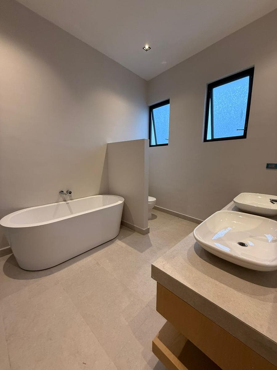 Luxury Home for Sale in a Gated Community with Amenities and a Pool