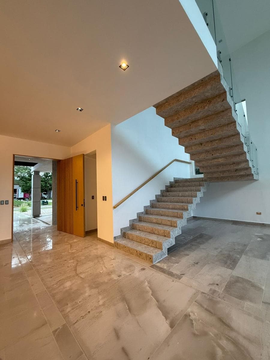 Luxury Home for Sale in a Gated Community with Amenities and a Pool