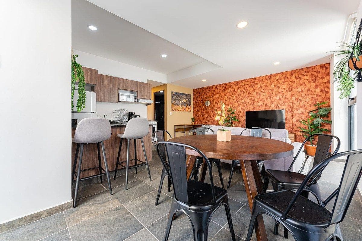 3-bedroom apartment with a HUGE rooftop garden just steps from the Roma neighborhood.