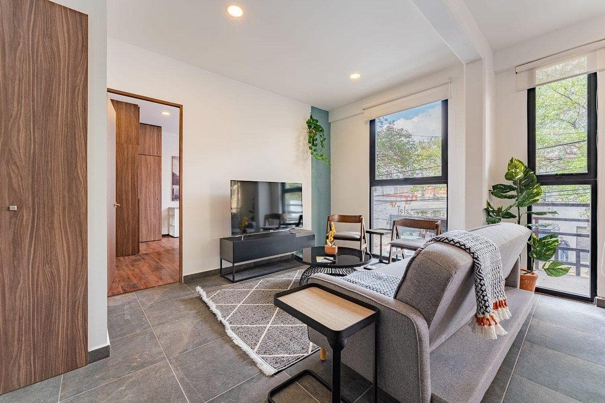 2-bedroom apartment with a private terrace just steps from the Roma neighborhood.