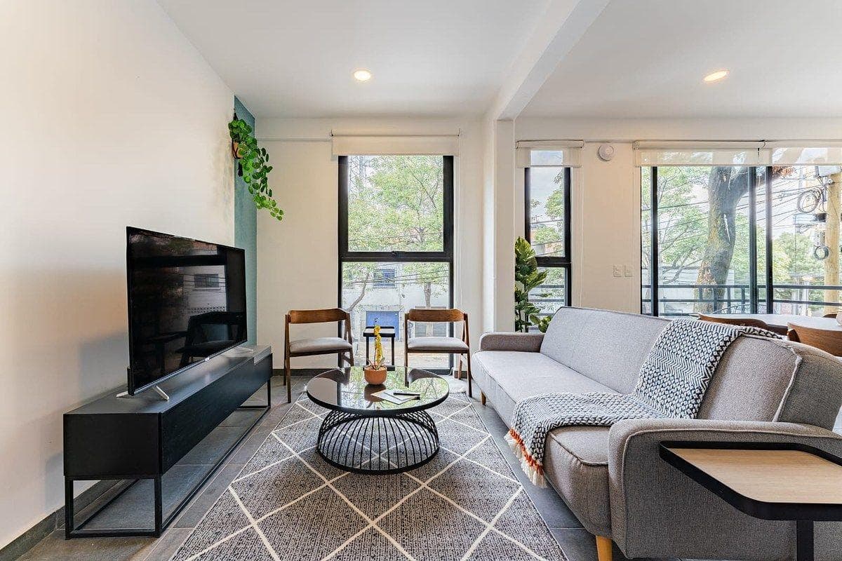 2-bedroom apartment with a private terrace just steps from the Roma neighborhood.