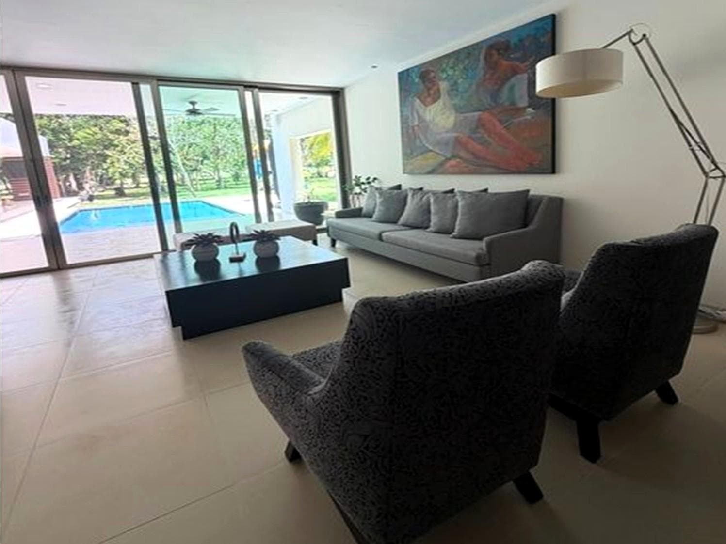 Beautiful Furnished Home Across from La Ceiba Golf Course with Solar Panels and a Generator